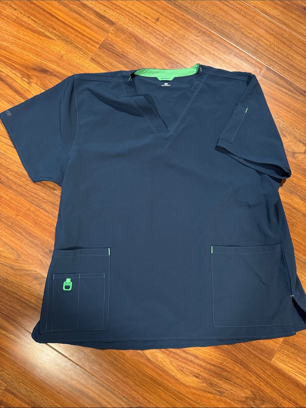 Carhartt Navy Blue Short Sleeve Scrub Top with Green Accents